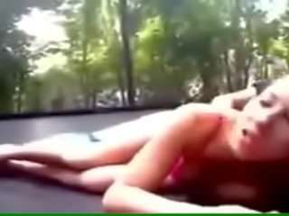 Attractive young teenager Fucks on a Trampoline